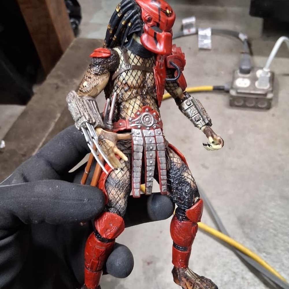 Predator Reptile Action Figure with Red and Black Armor